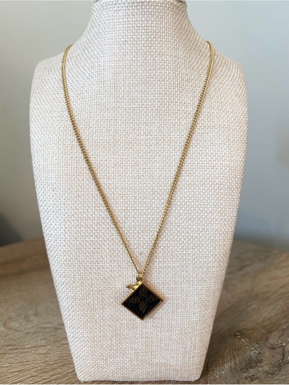 Gold Tone LV Fashion Pendant Necklace with Black Inlay.
